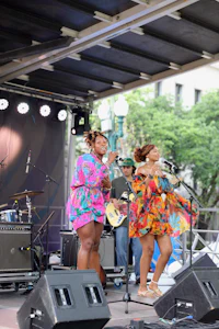 a group of women on stage